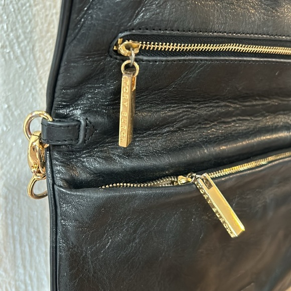 Tory Burch Black Leather Clutch with Gold Accents - Picture 8 of 9